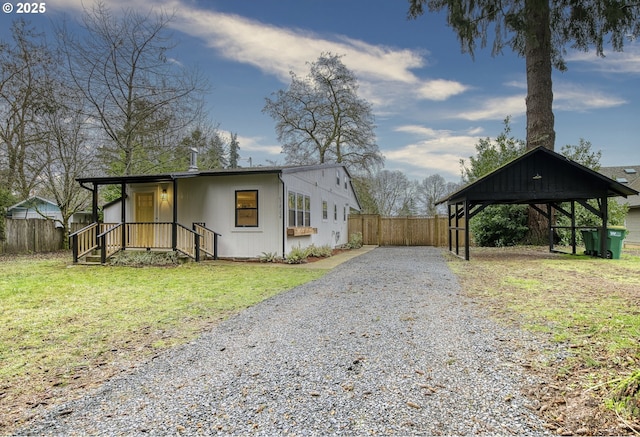 view of side of home featuring a lawn