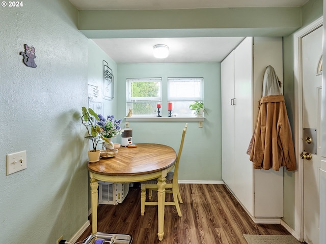 dining area featuring hardwood / wood-style flooring