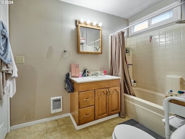 full bathroom with tile floors, shower / bath combo, oversized vanity, and toilet