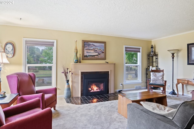 2405 Maple St, Longview, WA 98632 - living room with a textured ceiling, visible vents, crown molding, a fireplace with flush hearth, and carpet floors