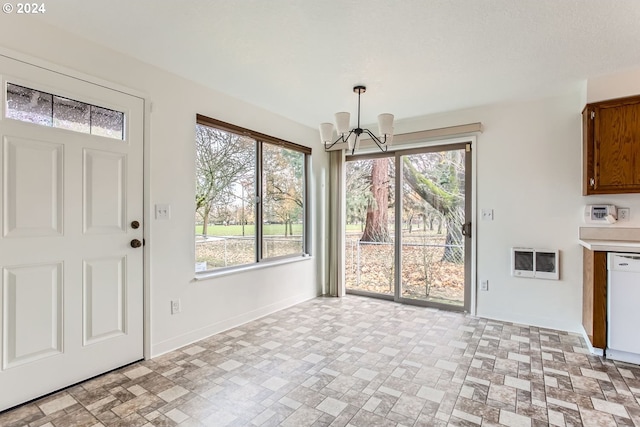 interior space with heating unit and a chandelier