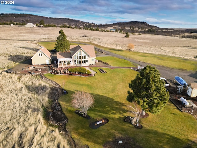 bird's eye view with a mountain view and a rural view