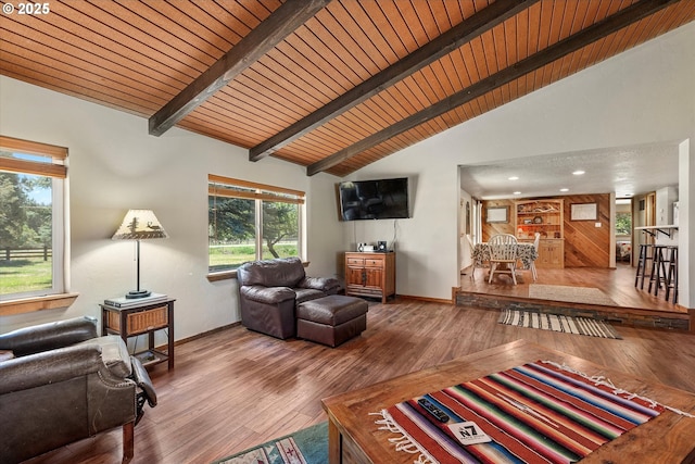 17943 Old Auburn Ln, Baker City, OR 97814 - living room featuring baseboards, wood ceiling with exposed beams, wood-type flooring, and high vaulted ceiling