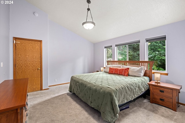 bedroom featuring baseboards, lofted ceiling, light colored carpet, and a textured ceiling