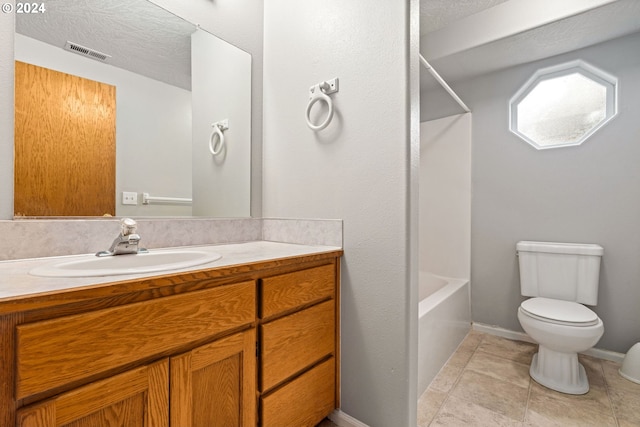 full bath featuring vanity, visible vents, tile patterned floors, toilet, and shower / bathtub combination