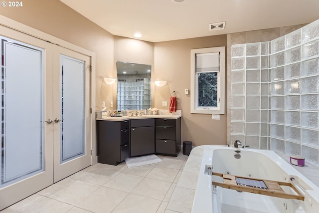 13829 SE Claremont St, Happy Valley, OR 97086 - full bath with vanity, a jetted tub, tile patterned flooring, french doors, and a shower
