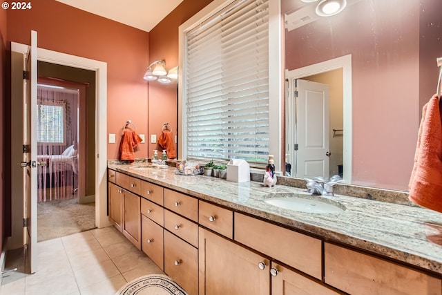 13829 SE Claremont St, Happy Valley, OR 97086 - bathroom featuring double vanity, tile patterned floors, plenty of natural light, and ensuite bath