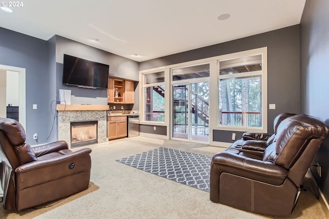 13829 SE Claremont St, Happy Valley, OR 97086 - living area with light colored carpet and a glass covered fireplace