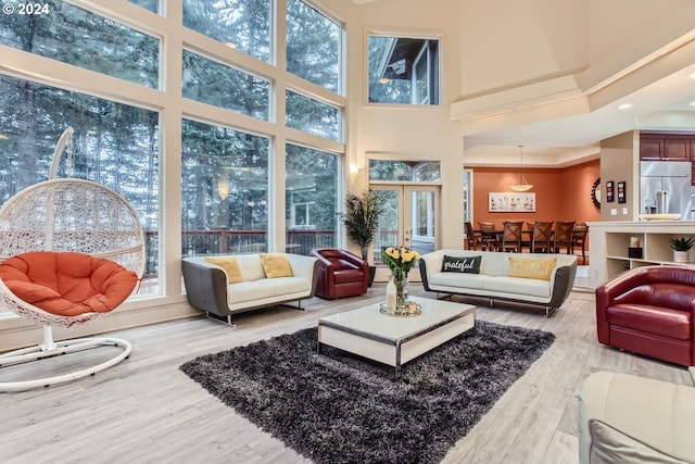 13829 SE Claremont St, Happy Valley, OR 97086 - living area with a towering ceiling and wood finished floors
