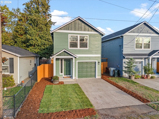 view of front facade featuring a garage and a front yard