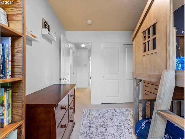 interior space featuring light colored carpet