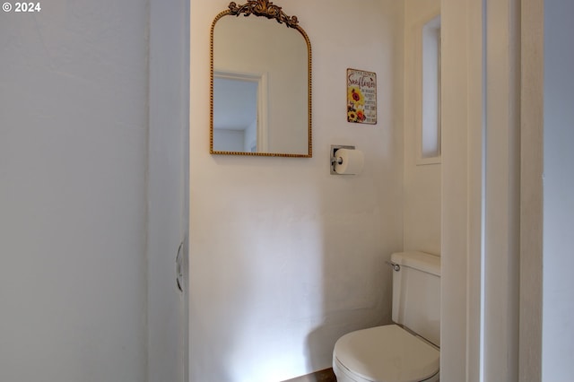 bathroom featuring toilet