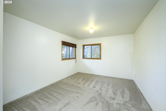 empty room with carpet floors