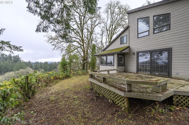 view of yard featuring a wooden deck