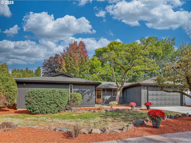 ranch-style home with a garage