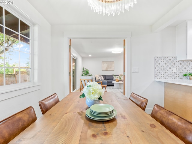 dining area with a notable chandelier