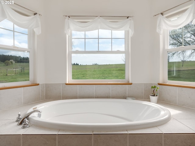 bathroom with a garden tub
