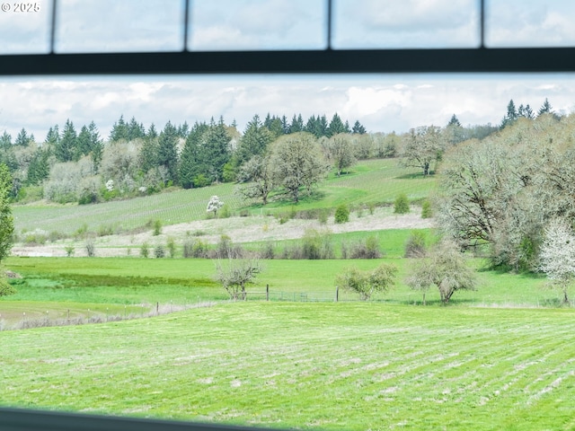 exterior space with a rural view