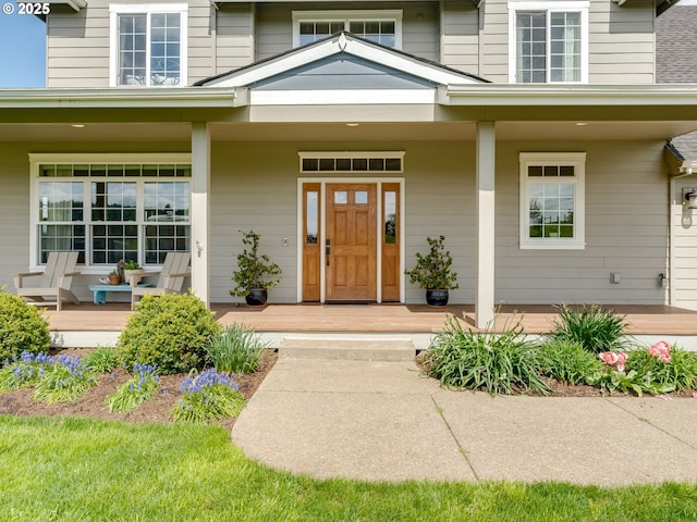 property entrance featuring covered porch