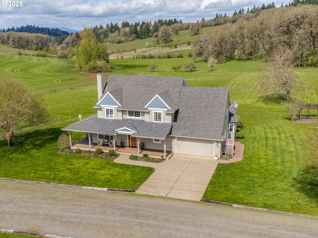 drone / aerial view with a rural view
