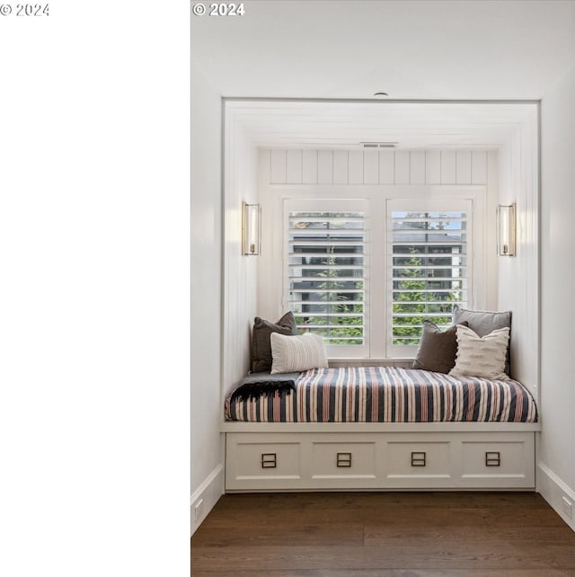 bedroom featuring dark wood-type flooring