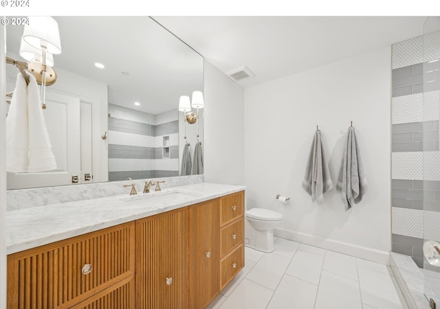 full bathroom with tiled shower, vanity, toilet, visible vents, and tile patterned flooring