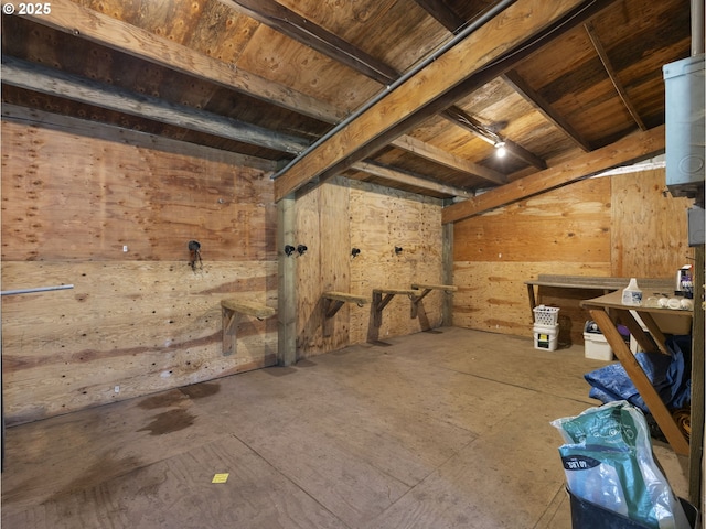 basement with wood walls and wood ceiling