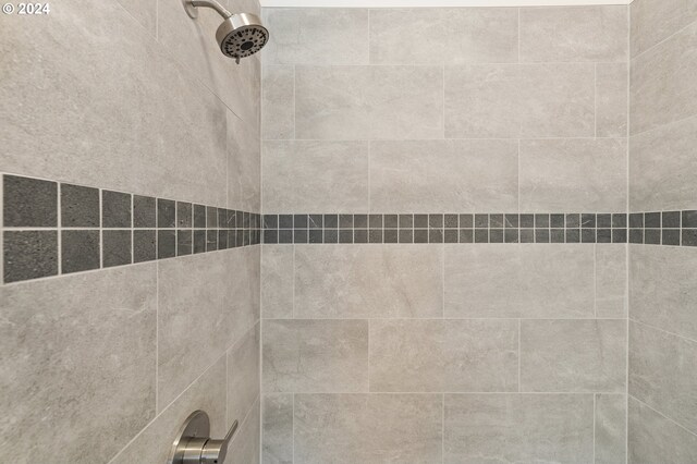 details with a tile shower