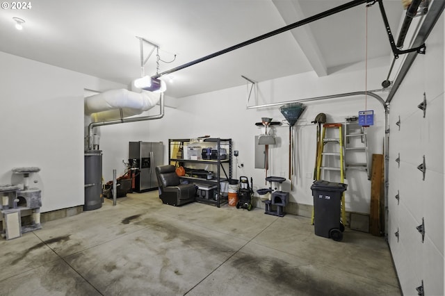 garage featuring stainless steel fridge and a garage door opener