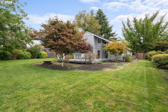 view of yard featuring a deck