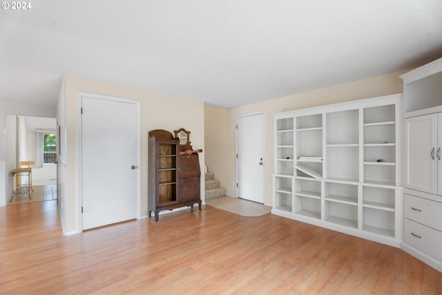 unfurnished room with light hardwood / wood-style floors