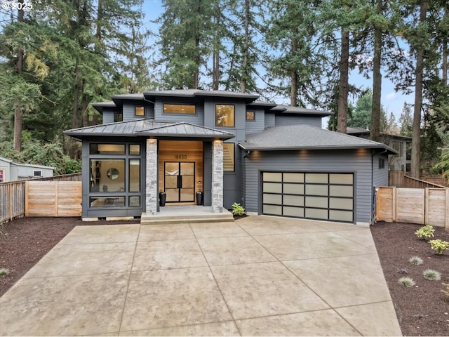 view of front of property featuring a garage