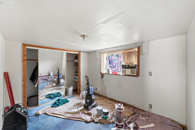 bedroom featuring a closet and cooling unit