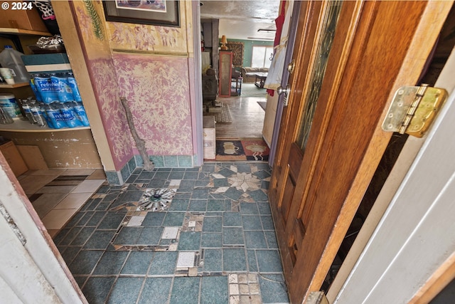 corridor with stone finish flooring