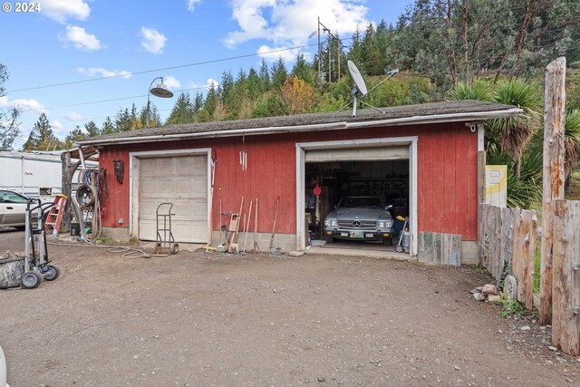 detached garage with fence
