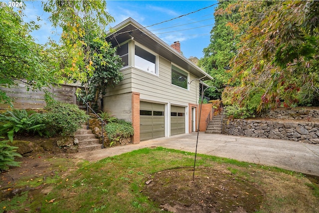 view of home's exterior with a garage