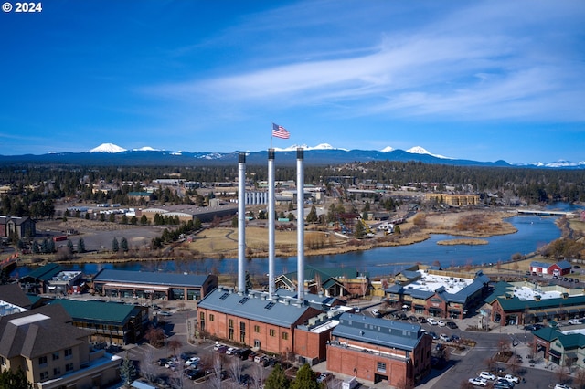 aerial view with a water and mountain view