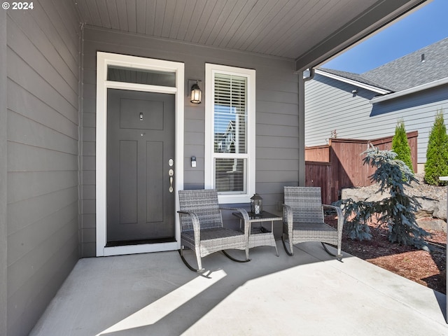 doorway to property featuring a patio