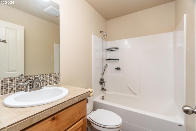 full bathroom with vanity, shower / bathtub combination, toilet, and backsplash