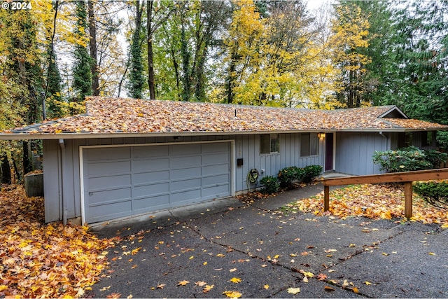 ranch-style home with a garage