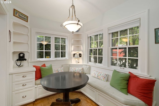 sitting room featuring light parquet flooring