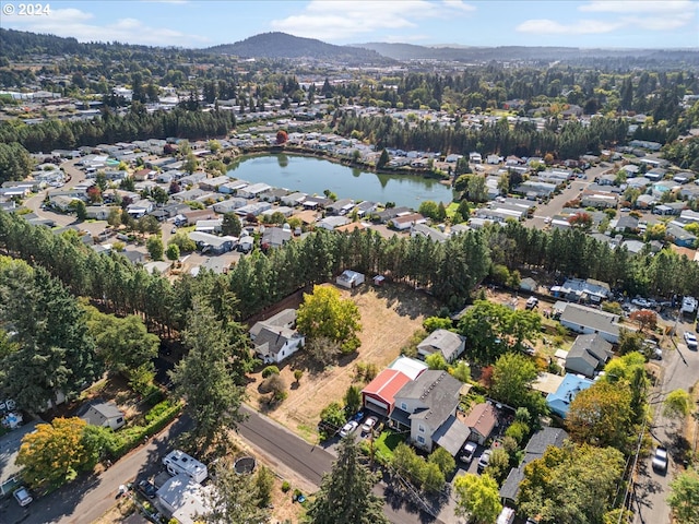 bird's eye view featuring a water and mountain view