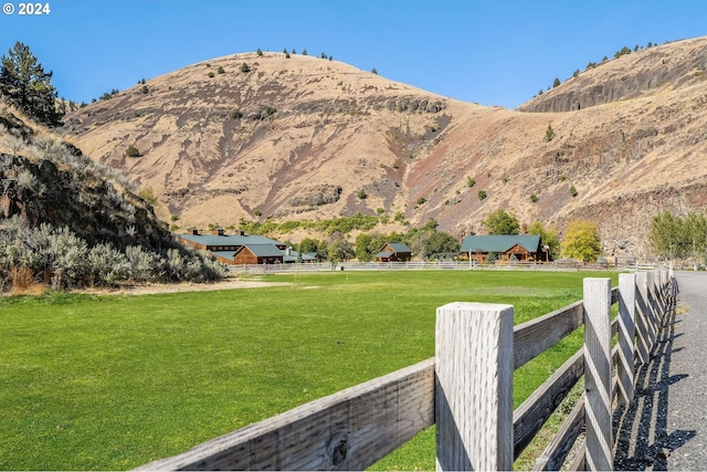 view of mountain feature with a rural view