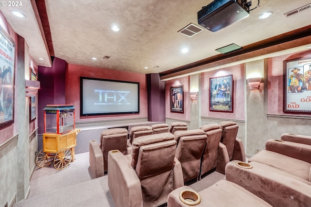 cinema room with light carpet