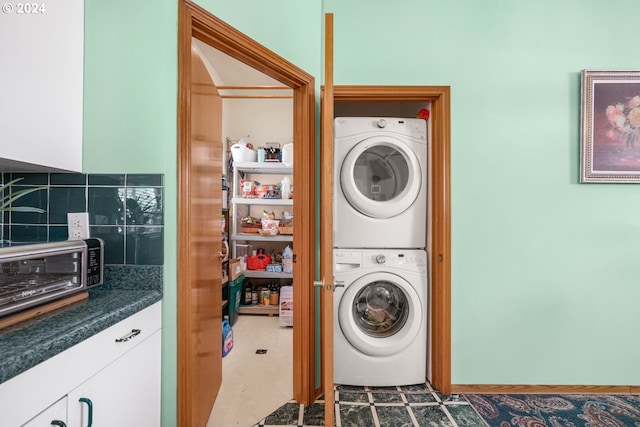 1730 SE 148th Ave, Portland, OR 97233 - washroom featuring stacked washer / drying machine and a toaster