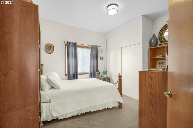 bedroom featuring carpet