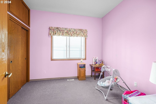 playroom featuring light colored carpet