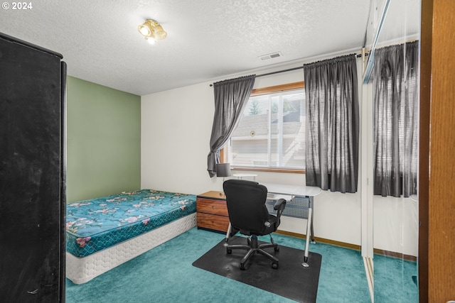 1730 SE 148th Ave, Portland, OR 97233 - carpeted bedroom featuring visible vents, a textured ceiling, and baseboards