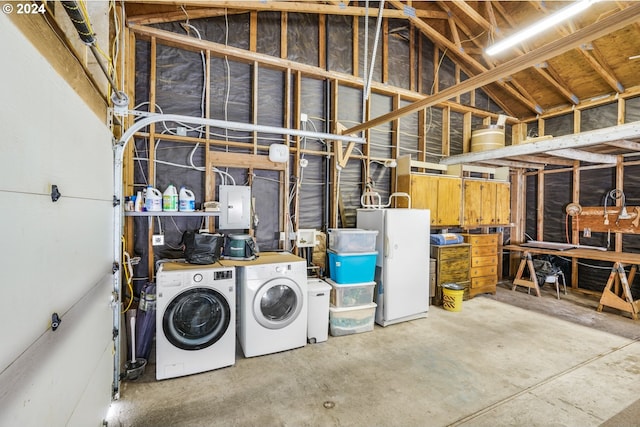 1730 SE 148th Ave, Portland, OR 97233 - interior space featuring freestanding refrigerator, electric panel, and washing machine and clothes dryer