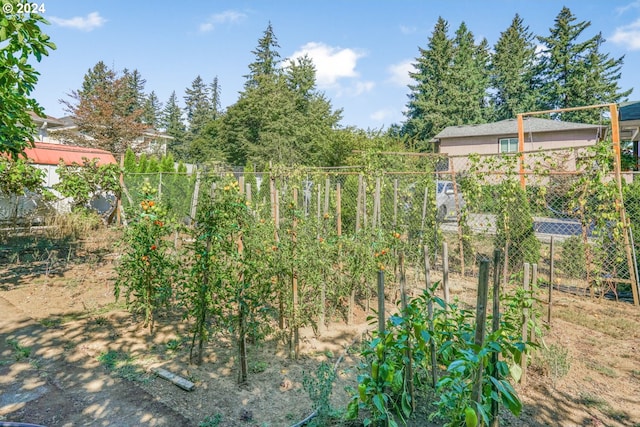 1730 SE 148th Ave, Portland, OR 97233 - view of yard featuring a vegetable garden and fence